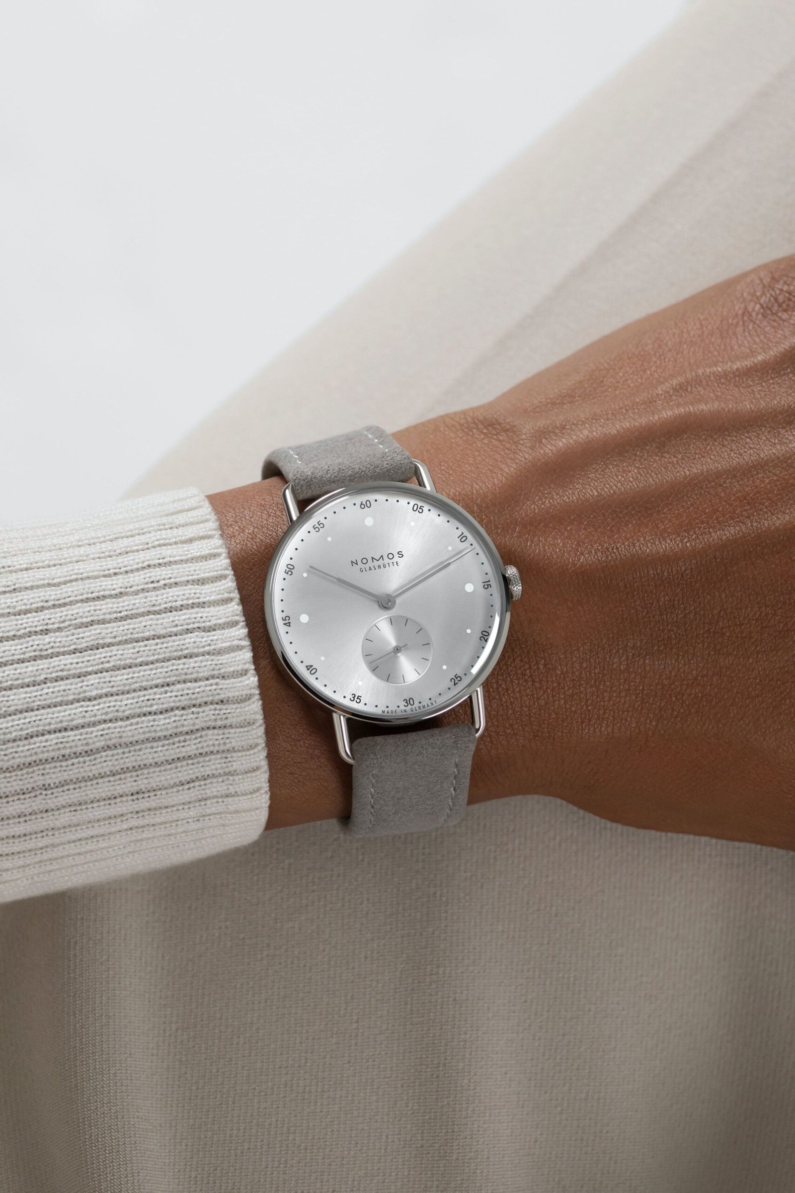 Nomos-Glashutte-Metro-33-All-Silver-Wrist-Shots-1-scaled.jpg