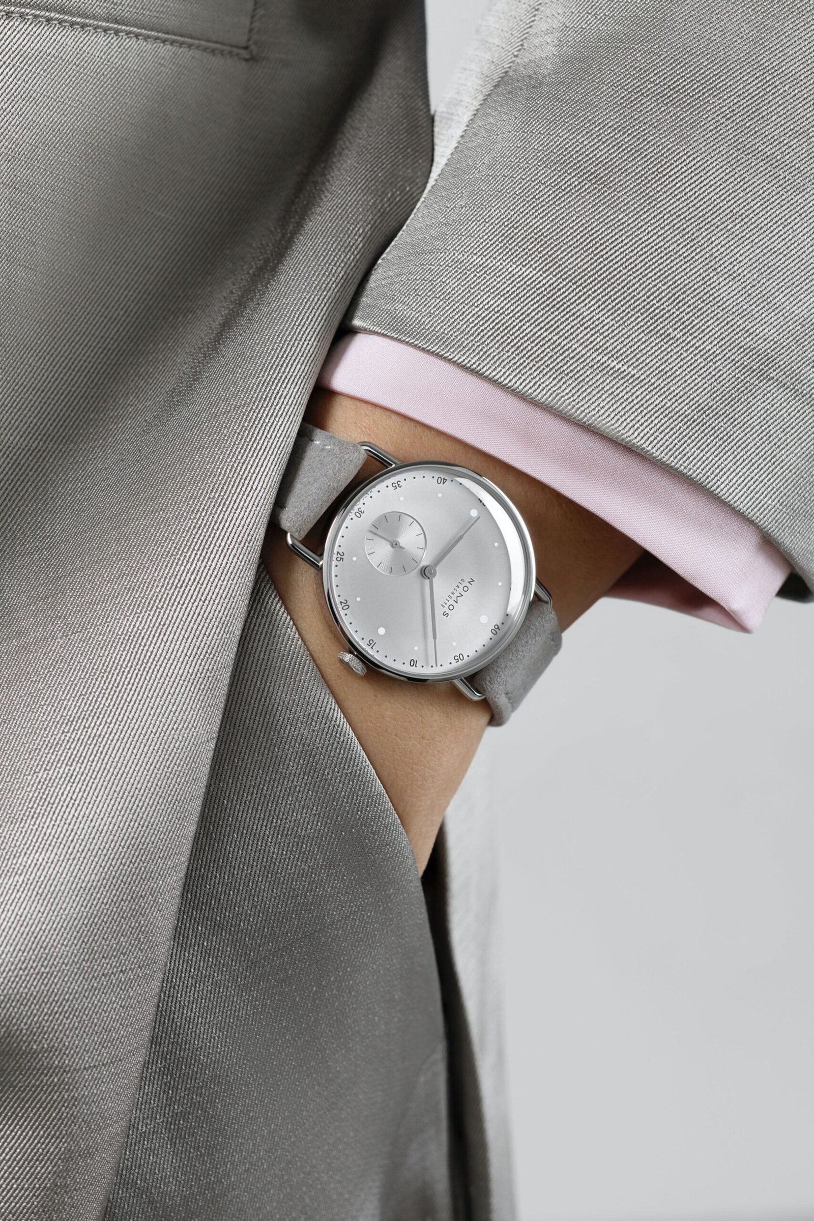 Nomos-Glashutte-Metro-33-All-Silver-Wrist-Shots-2-scaled.jpg