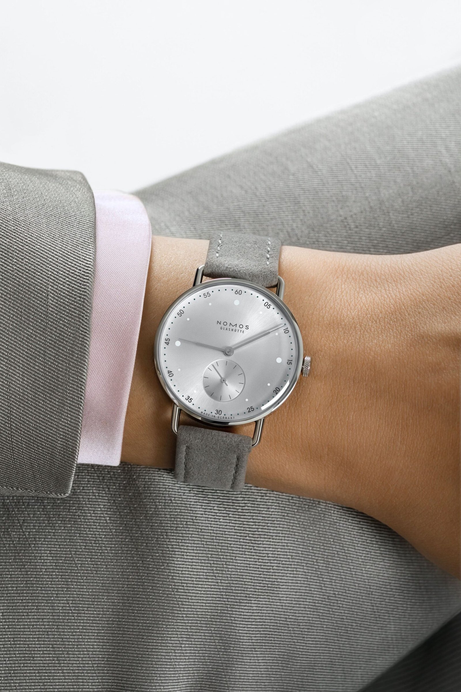 Nomos-Glashutte-Metro-33-All-Silver-Wrist-Shots-3-scaled.jpg