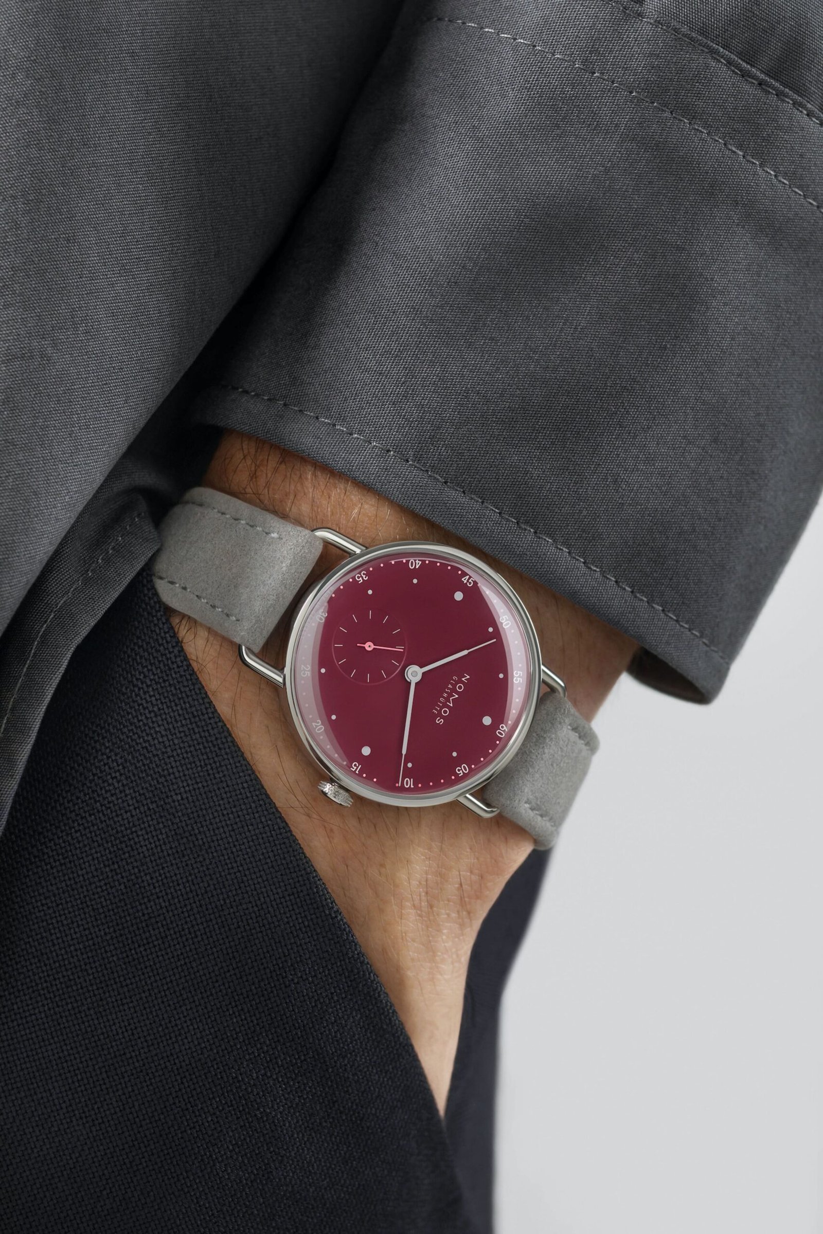 Nomos-Glashutte-Metro-33-Muted-Red-Wrist-Shots-1-scaled.jpg