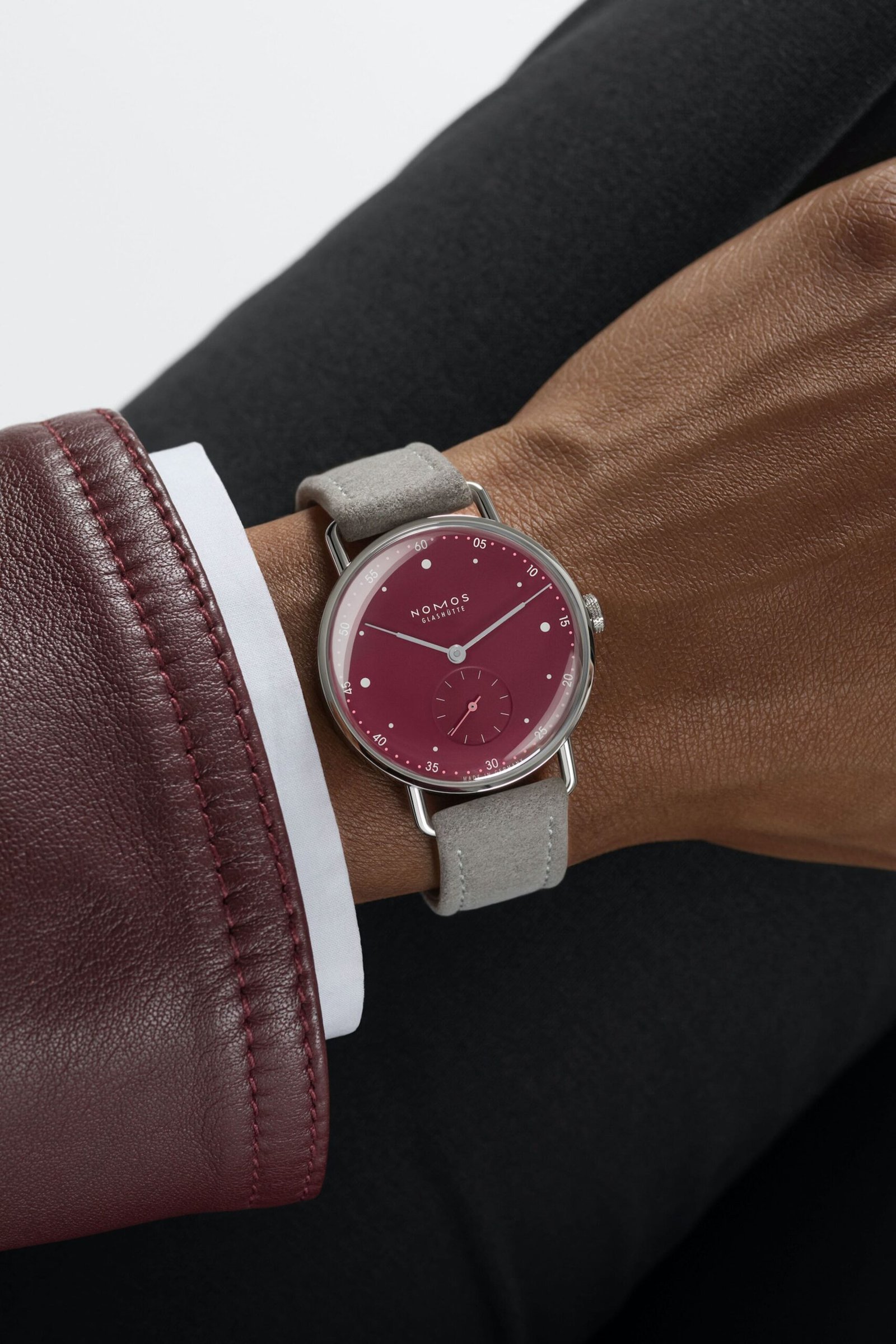 Nomos-Glashutte-Metro-33-Muted-Red-Wrist-Shots-3-scaled.jpg