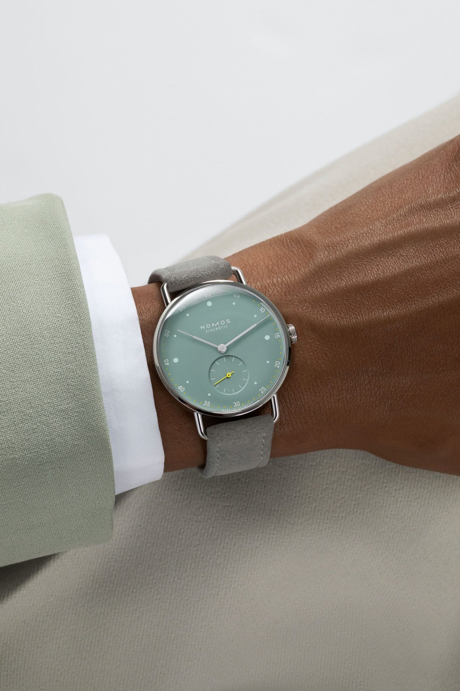 Nomos-Glashutte-Metro-33-Sage-Wrist-Shots-1-scaled.jpg